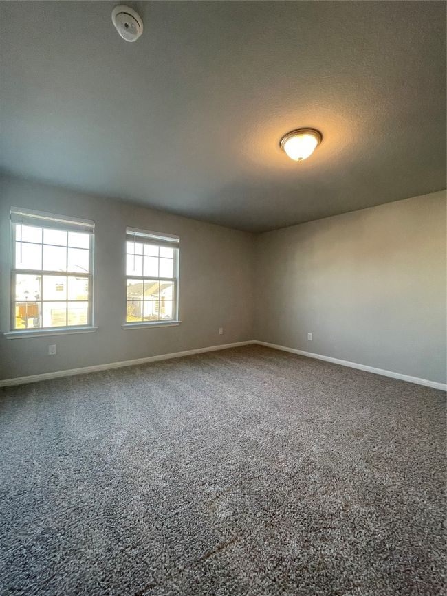 Unfurnished room with baseboards and carpet floors | Image 14