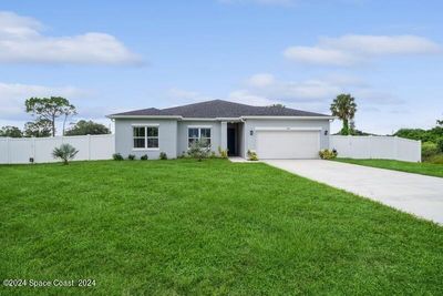 900 Coquina Street Se, House other with 4 bedrooms, 3 bathrooms and null parking in Palm Bay FL | Image 2