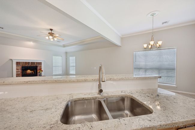 Never feel left out of family gatherings from the kitchen. | Image 9