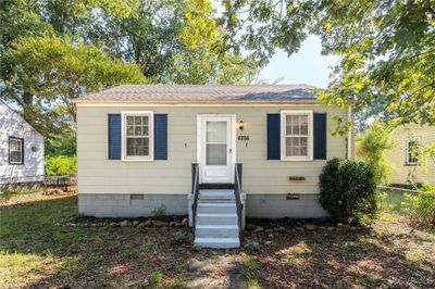 View of bungalow-style home | Image 1