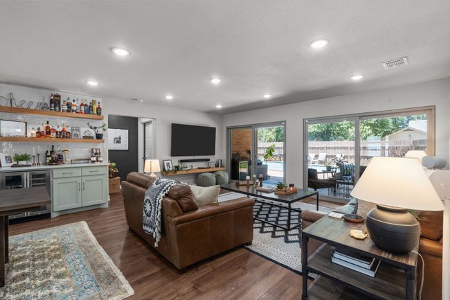 Living room featuring, a dry bar, recessed lighting | Image 14