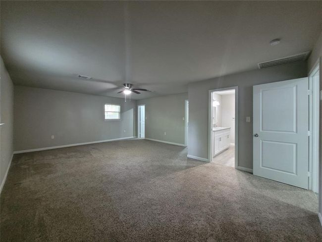Plenty of room for King bed, dressers and work out equipment. | Image 25