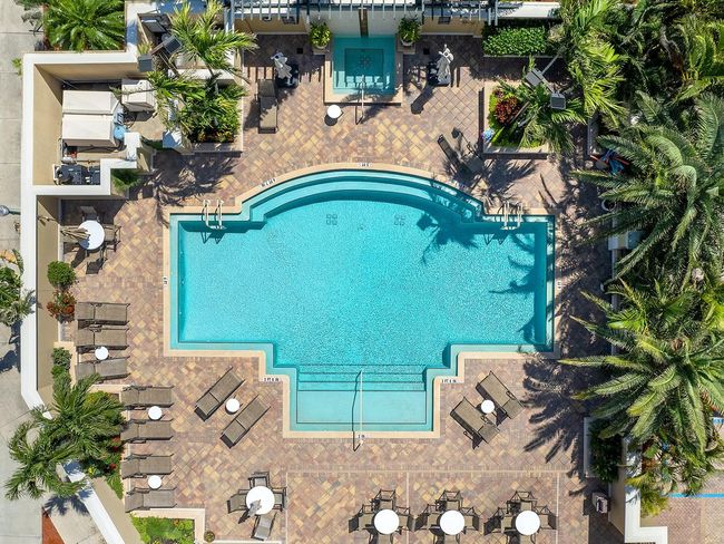 view of pool, deck, gardens, Bbq's, outdoor kitchen and dining | Image 19