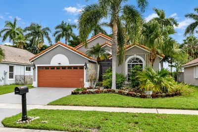 1963 Oak Berry Circle, House other with 3 bedrooms, 2 bathrooms and null parking in Wellington FL | Image 1