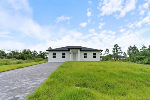 710 Peacock Ave, Lehigh Acres, FL, 33974-4659 | Card Image