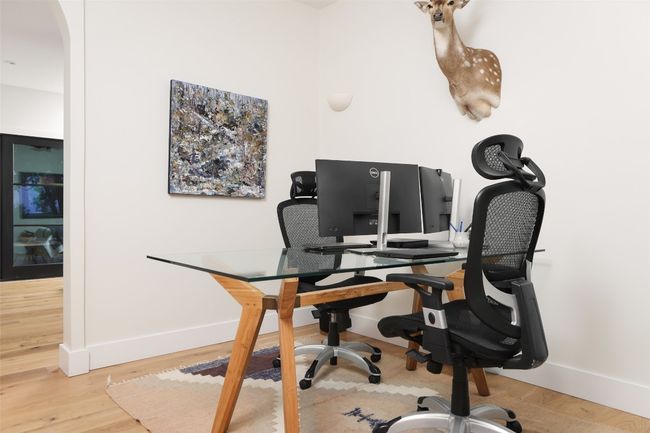 Primary bedroom sitting/office space with arched walkway | Image 22