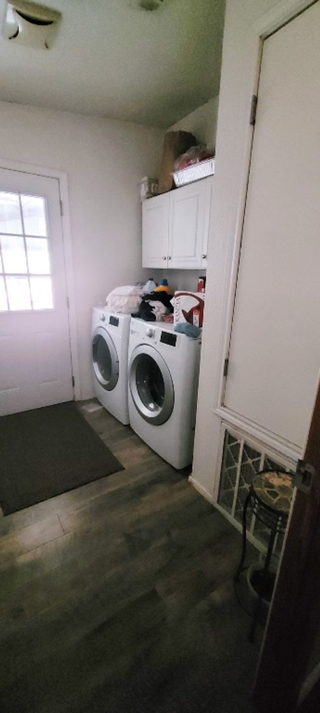 Just within the second (side) entrance is the laundry room | Image 7
