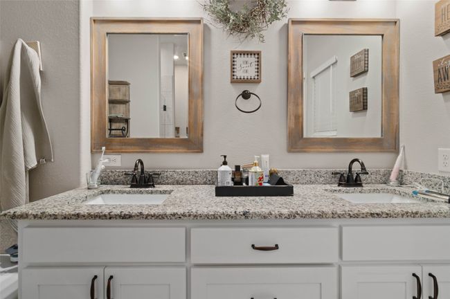 Primary bathroom featuring double vanity | Image 19