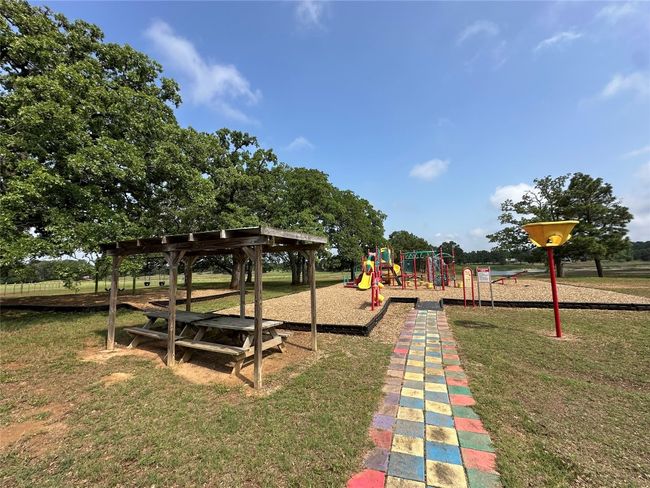 Circle D playground with a yard | Image 37