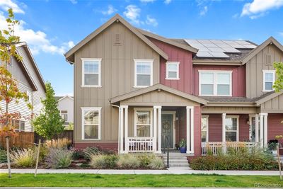 6039 Dayton Street, Townhouse with 4 bedrooms, 3 bathrooms and 2 parking in Denver CO | Image 1