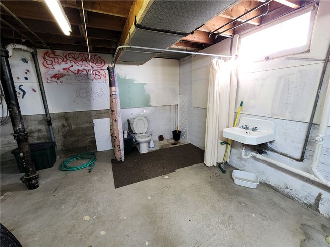 Unfinished below grade area featuring a sink | Image 40
