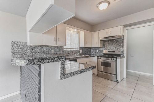 3918 Dalmatian Dr, Houston, TX, 77045-6311 | Card Image