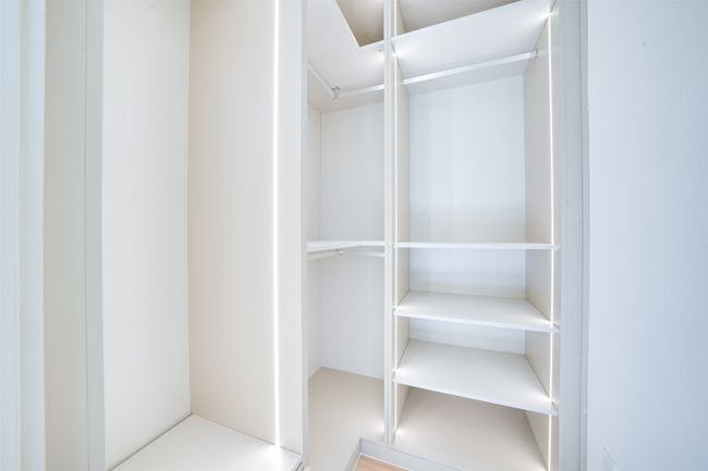 View of walk in closet | Image 23