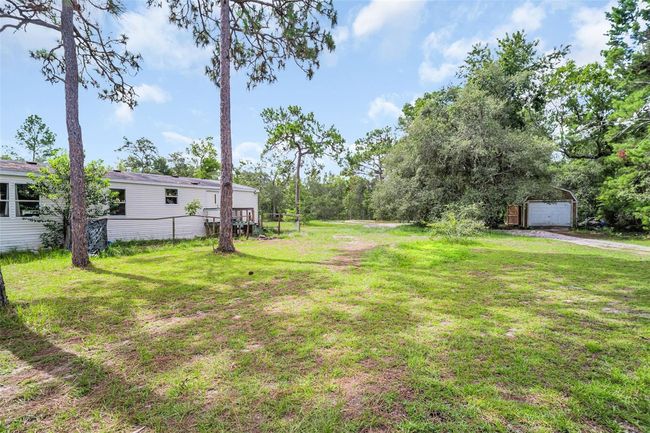 Rear of Home and Storage Shed View | Image 23