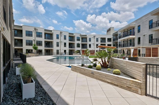 Community pool with a patio | Image 28