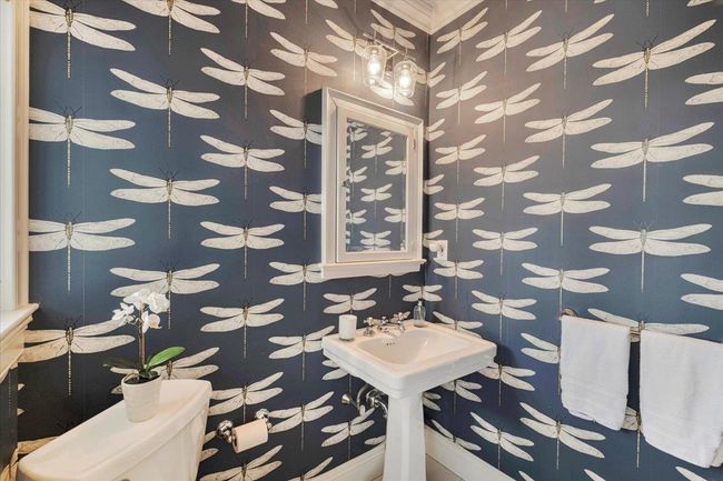 Cheerful powder room. | Image 10