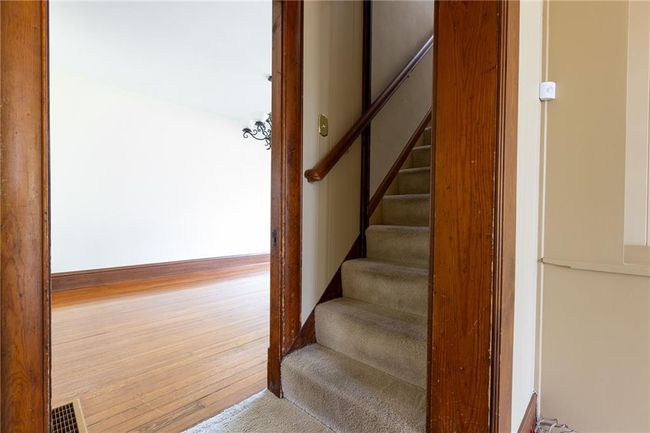 Staircase with light wood-type flooring | Image 30