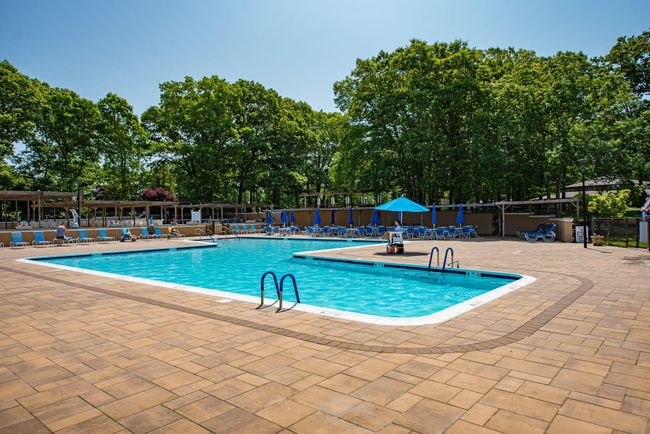 View of pool featuring a patio | Image 13