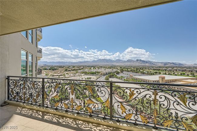Balcony featuring a mountain view | Image 27