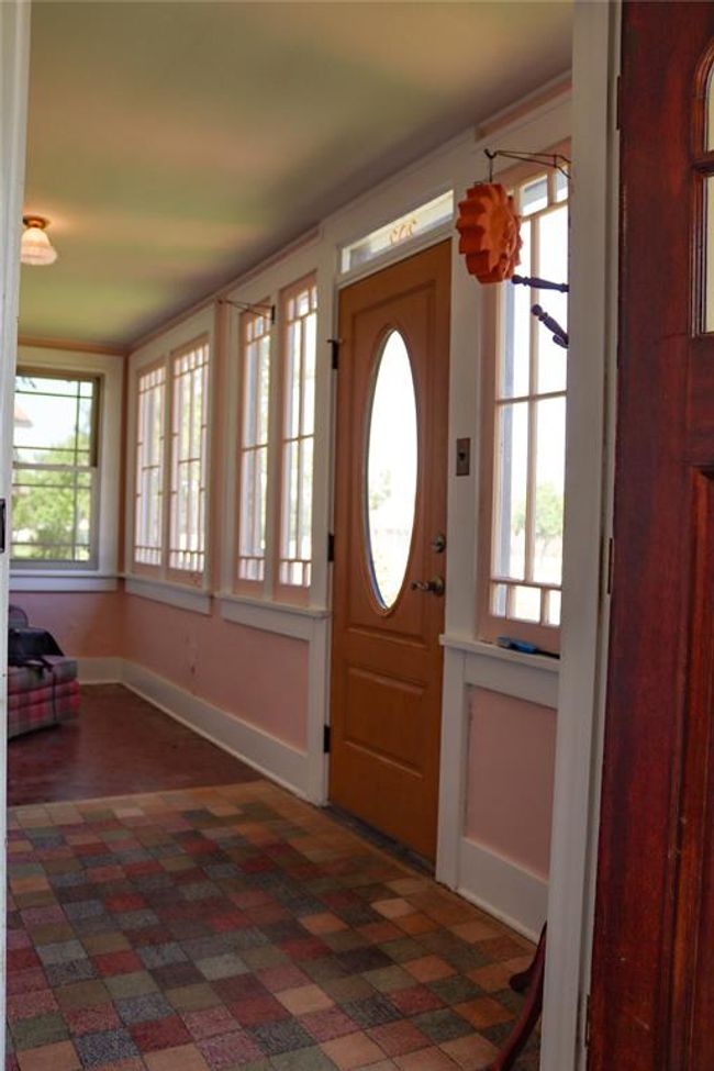 A well-lit entryway Foyer | Image 9