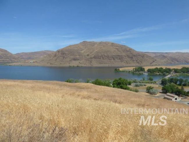 Water view with mountains | Image 15
