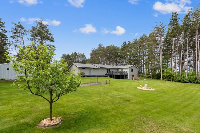 View from the rear yard shows a relaxing atmosphere. | Image 35