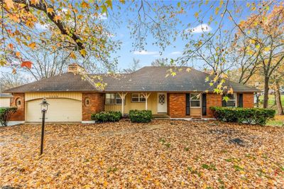 Single story home featuring a garage | Image 2