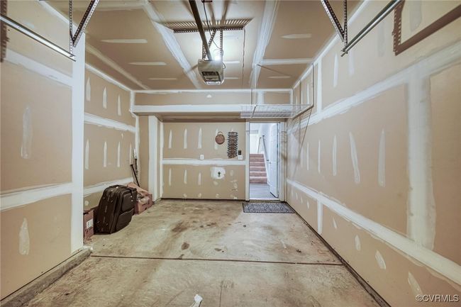 Garage featuring a garage door opener | Image 27