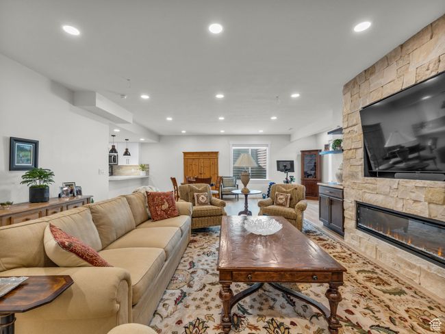 Living room with recessed lighting and a fireplace | Image 31