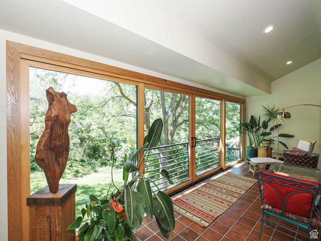 Sunroom / solarium with tile patterned floors, recessed lighting, and vaulted ceiling | Image 17