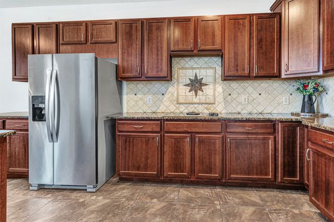huge kitchen with stainless steel applicances | Image 17