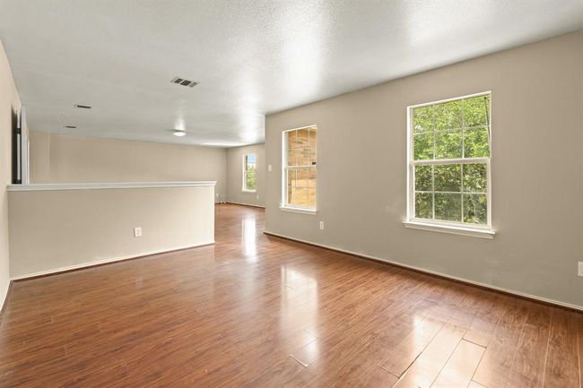Primary Suite with Seating Area (upstairs) | Image 24