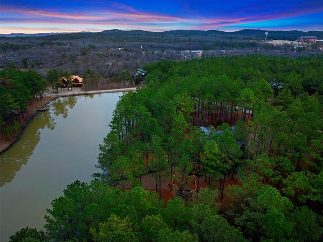 Aerial view at dusk featuring a water and mountain view | Image 47