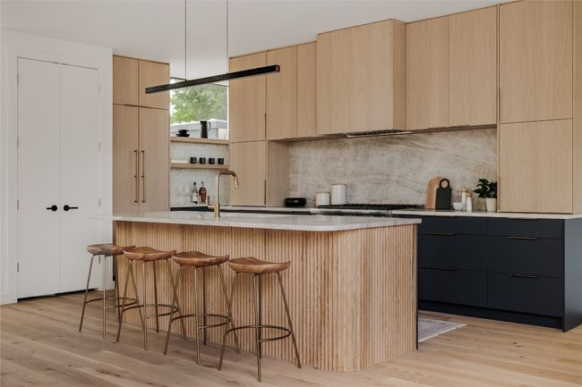 Kitchen with modern cabinets and light brown cabinets | Image 15