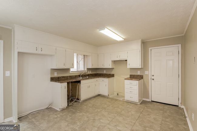 7259 Merlin Way, House other with 4 bedrooms, 3 bathrooms and null parking in Riverdale GA | Image 7