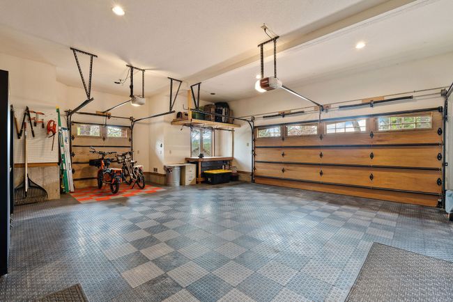Large 3-car garage with new flooring | Image 53