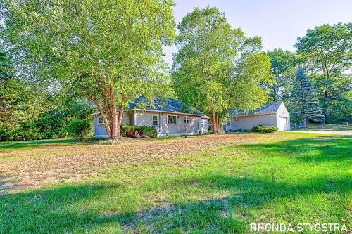 5090 Wakefield Ave Ne, Comstock Park, MI, 49321-8993 | Card Image