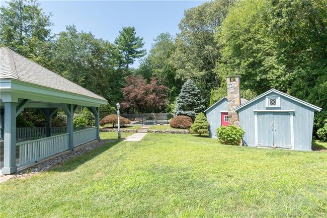 The two-car car port and the double Corn Crib out buildings are easily accessable. | Image 25