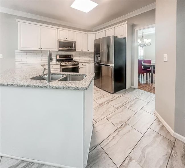 1485 Oglethorpe Run Ln, House other with 4 bedrooms, 3 bathrooms and 2 parking in Suwanee GA | Image 4