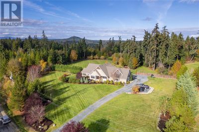 1075 Matuka Dr, House other with 5 bedrooms, 3 bathrooms and 6 parking in Nanoose Bay BC | Image 1