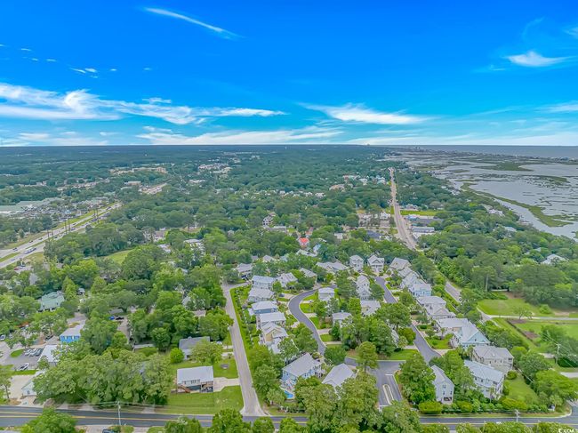 Aerial perspective of suburban area with a nearby body of water | Image 40