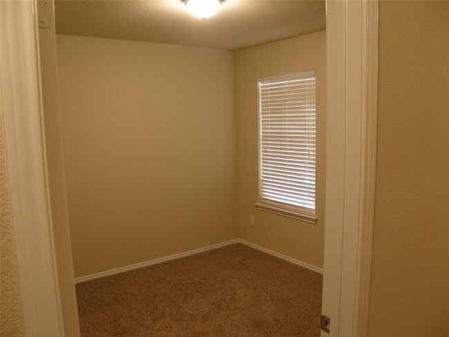 Carpeted empty room with baseboards | Image 5