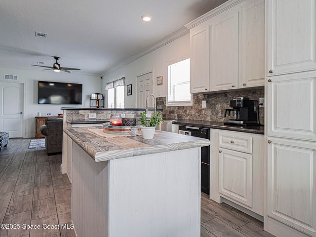 623 Hyacinth Cir, House other with 3 bedrooms, 2 bathrooms and null parking in Barefoot Bay FL | Image 23