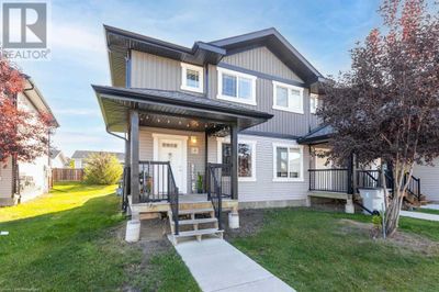 5 - 1521 47 C Ave, Townhouse with 3 bedrooms, 2 bathrooms and 2 parking in Lloydminster SK | Image 2