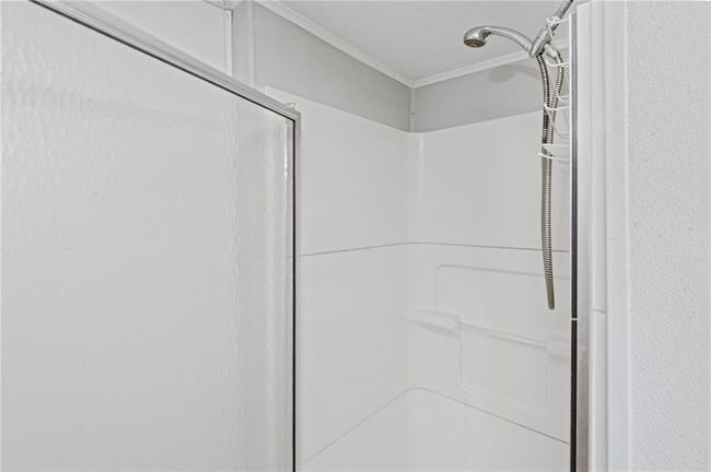 Full bathroom featuring a stall shower | Image 12