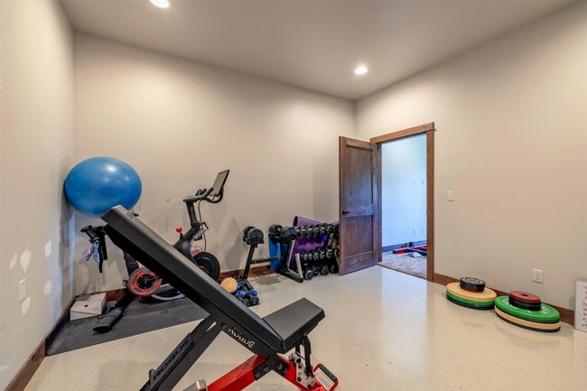 Workout area featuring recessed lighting and baseboards | Image 40