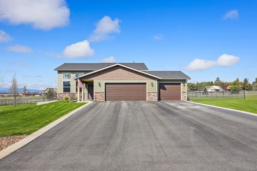 411 Spruce Meadows Loop, Kalispell, MT, 59901-1031 | Card Image