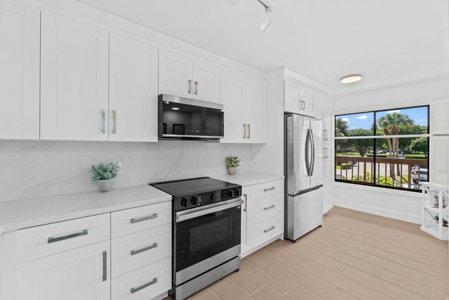 204 - 10092 Cedar Point 204 Boulevard, Condo with 2 bedrooms, 2 bathrooms and null parking in Boynton Beach FL | Image 14