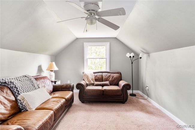 This versatile room is the perfect spot for an extra family room, media room or a spare bedroom for guets, there's even a step in closet | Image 34