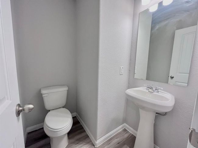 Half bath on the main downstairs floor. Virtually staged for inspiration. | Image 31